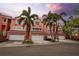 Charming row of townhomes with attached garages, showcasing an attractive and convenient residential setting at 14584 El Paseo Dr, Seminole, FL 33776