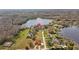 Beautiful aerial view of the home and surrounding lakes and neighborhood at 19242 Blount Rd, Lutz, FL 33558