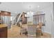 Cozy dining area near kitchen with stylish chandelier and seating at 19242 Blount Rd, Lutz, FL 33558