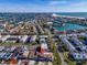 Expansive aerial view showcasing the property's proximity to the water, townhouses, and coastal amenities at 227 126Th Ave, Treasure Island, FL 33706