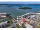 Serene aerial view of the property near the waterfront, complemented by lush coastal scenery and charming surroundings at 227 126Th Ave, Treasure Island, FL 33706