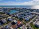 Gorgeous aerial view of the property near the water, highlighting the surrounding community and coastal landscape at 227 126Th Ave, Treasure Island, FL 33706