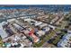 Breathtaking aerial view of the property situated near the water, townhouses, and lush coastal landscape at 227 126Th Ave, Treasure Island, FL 33706