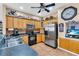 Well-equipped kitchen with stainless steel appliances, ample cabinet space, and tiled backsplash at 227 126Th Ave, Treasure Island, FL 33706