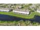 Townhomes feature screened in porches and pond views at 2824 Conch Hollow Dr, Brandon, FL 33511