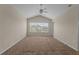 Bedroom offering natural light and neutral carpeting, and ceiling fan at 2824 Conch Hollow Dr, Brandon, FL 33511
