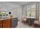 Kitchen and breakfast nook featuring marble floors, and views of the living room at 2824 Conch Hollow Dr, Brandon, FL 33511