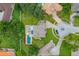 Top-down aerial shot of a home with a backyard pool and manicured landscaping at 3018 N 164Th Pl, Clearwater, FL 33760