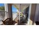 Balcony featuring patio seating and views of the beautiful beach and waterfront at 3400 Gulf Blvd # 304, Belleair Beach, FL 33786