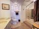 Bathroom showcasing tub and shower, vanity with storage, and modern toilet at 3400 Gulf Blvd # 304, Belleair Beach, FL 33786