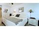 Bright and inviting bedroom featuring neutral decor, and ample natural light at 3400 Gulf Blvd # 304, Belleair Beach, FL 33786