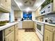 Spacious kitchen with ample cabinet space and modern appliances at 3400 Gulf Blvd # 304, Belleair Beach, FL 33786