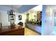 Inviting living room area showcasing bright lighting and a glimpse into the kitchen at 3400 Gulf Blvd # 304, Belleair Beach, FL 33786