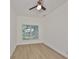 Bright bedroom with ceiling fan and natural light from a window view at 3409 E 11Th Ave, Tampa, FL 33605