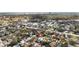 Panoramic aerial shot of community with cityscape in the distance, pinpointing the location of a home with marker pin at 3601 W Platt St, Tampa, FL 33609