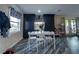 Bright dining area featuring stylish floors and built-in cabinetry at 38055 Avion Dr, Zephyrhills, FL 33542