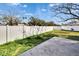 Back yard featuring a white fence at 415 Maplewood Cir, Oldsmar, FL 34677