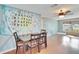 Inviting dining room with table, chairs, and decor, creating a cozy and stylish space at 415 Maplewood Cir, Oldsmar, FL 34677