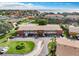 Aerial view of the community featuring well-manicured lawns, tidy parking, and nearby waterfront at 4570 Overlook Ne Dr # 282, St Petersburg, FL 33703