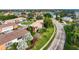 An aerial shot of an apartment complex featuring lush landscaping, close to a main road and waterfront properties at 4570 Overlook Ne Dr # 282, St Petersburg, FL 33703