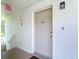 Unit 282 entrance with keyless entry and is located next to the stairwell at 4570 Overlook Ne Dr # 282, St Petersburg, FL 33703