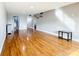 Bright living room with hardwood floors and neutral paint, offering a welcoming space at 4570 Overlook Ne Dr # 282, St Petersburg, FL 33703