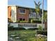 Lake Overlook Condominiums signage amidst lush greenery and a brick building exterior at 4570 Overlook Ne Dr # 282, St Petersburg, FL 33703