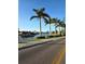 Scenic street view of palm trees lining a waterfront canal and attractive homes at 4570 Overlook Ne Dr # 282, St Petersburg, FL 33703