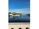Picturesque waterfront view with boats docked and palm trees lining the canal at 4570 Overlook Ne Dr # 282, St Petersburg, FL 33703