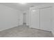 The bedroom includes tiled floors and closet with sliding doors at 4638 Heavens Way, New Port Richey, FL 34652