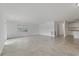 Spacious living room with tile flooring and lots of natural light at 4638 Heavens Way, New Port Richey, FL 34652