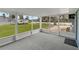 Screened in patio offers views of a trailer, lake and dock at 4638 Heavens Way, New Port Richey, FL 34652