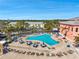 Resort-style pool and clubhouse with a pool and a waterfront view at 4842 Coquina Key Se Dr # B, St Petersburg, FL 33705