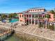 Resort-style clubhouse with a pool and a waterfront view at 4842 Coquina Key Se Dr # B, St Petersburg, FL 33705