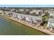 Aerial view of waterfront residences with private patios and balconies, offering stunning coastal living at 4842 Coquina Key Se Dr # B, St Petersburg, FL 33705