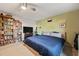 Comfortable bedroom features a large bookshelf at 4842 Coquina Key Se Dr # B, St Petersburg, FL 33705