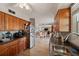 Kitchen featuring wood cabinets and stainless steel refrigerator at 4842 Coquina Key Se Dr # B, St Petersburg, FL 33705