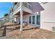 Exterior patio offering scenic waterfront views, seating, and easy access to indoor living spaces at 4842 Coquina Key Se Dr # B, St Petersburg, FL 33705