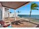 Waterfront patio with brick pavers and a seating area for enjoying the view and outdoor living at 4842 Coquina Key Se Dr # B, St Petersburg, FL 33705