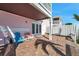 Outdoor patio featuring brick pavers, seating, and direct access into the home, perfect for relaxing and entertaining at 4842 Coquina Key Se Dr # B, St Petersburg, FL 33705