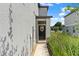 Inviting front entrance with a decorative wreath and a covered porch at 5994 Shiner St, Land O Lakes, FL 34638