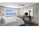 Main bedroom with beautiful water views, light-blocking curtains and closet at 611 Brightwaters Ne Blvd, St Petersburg, FL 33704