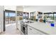 Modern kitchen with sleek countertops, stainless steel appliances, and picturesque views at 9525 Blind Pass Rd # 301, St Pete Beach, FL 33706