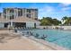 Enjoy the refreshing pool with clear blue water and friendly swimmers at 9525 Blind Pass Rd # 301, St Pete Beach, FL 33706