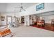 Open-concept space connecting the lanai, kitchen, and dining areas for seamless entertaining and living at 1008 Royal Birkdale Dr, Tarpon Springs, FL 34688