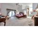 Spacious main bedroom featuring high ceilings, and a sitting area at 1008 Royal Birkdale Dr, Tarpon Springs, FL 34688