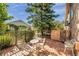 Charming patio with brick flooring and ornate outdoor furniture, perfect for relaxing or entertaining outdoors at 1008 Royal Birkdale Dr, Tarpon Springs, FL 34688
