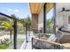 Inviting balcony with comfortable seating, featuring a glass railing with views of the surrounding landscape at 101 W Warren Ave # 1, Tampa, FL 33602