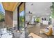 Relaxing balcony with outdoor seating, offering seamless indoor-outdoor living with views of the main living area at 101 W Warren Ave # 1, Tampa, FL 33602
