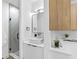 Modern bathroom featuring a glass-enclosed shower, sleek vanity, and stylish fixtures at 101 W Warren Ave # 1, Tampa, FL 33602